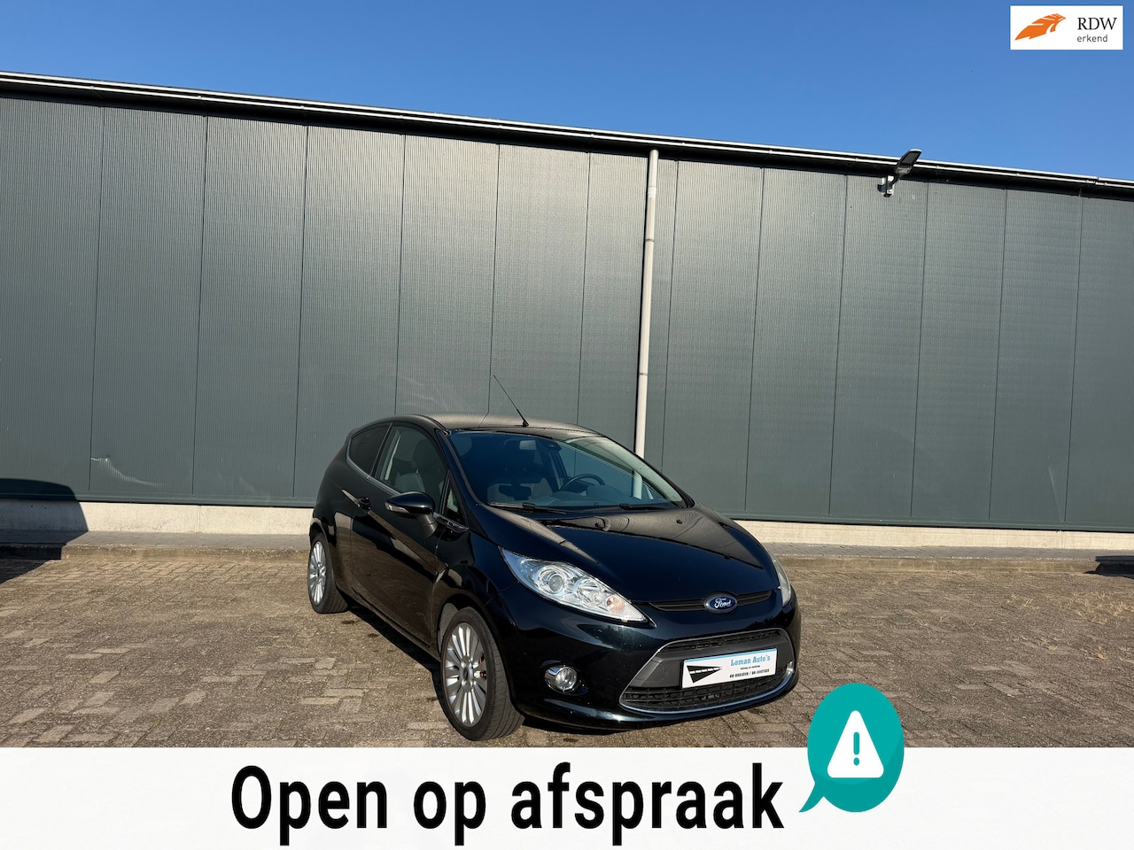 Ford Fiesta - 1.25 Ghia 1.25 Ghia - AutoWereld.nl