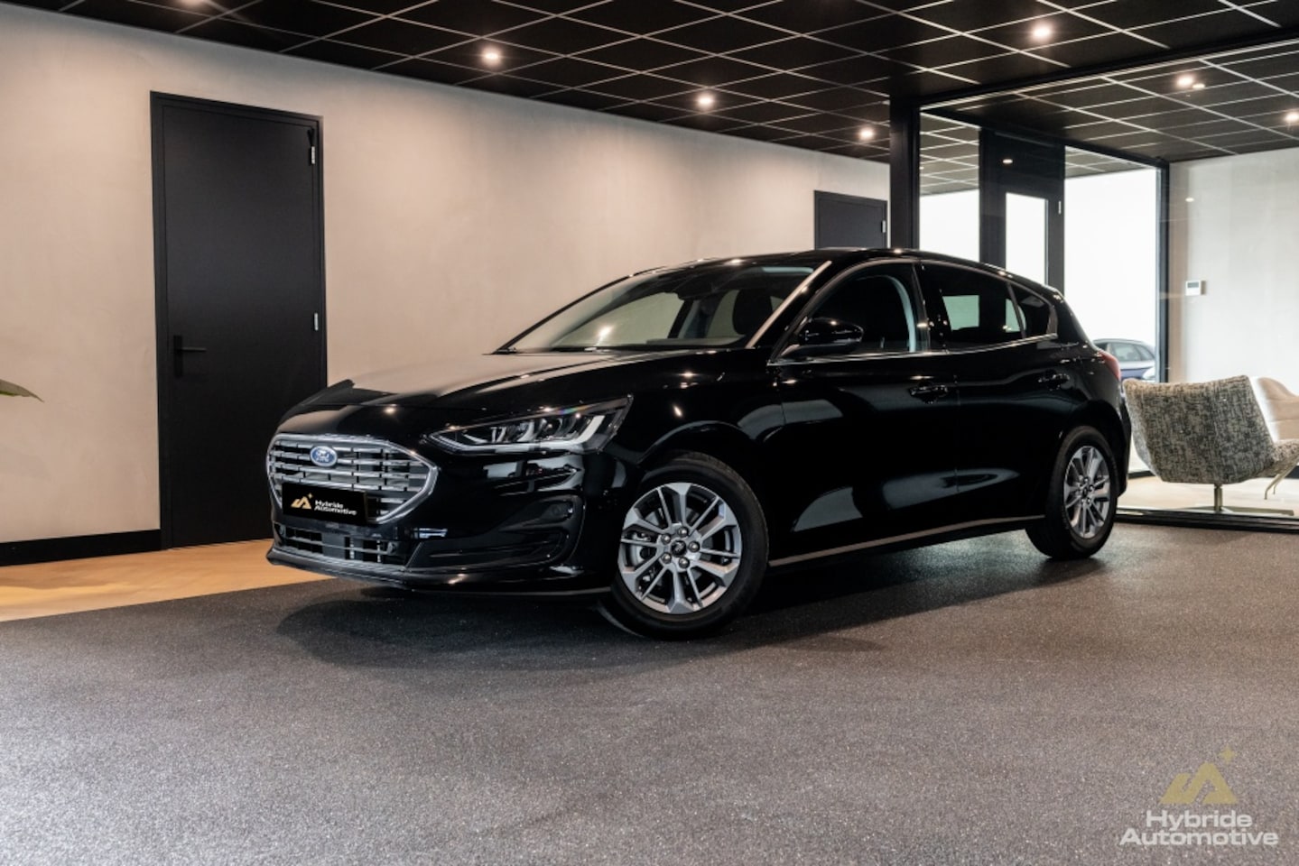 Ford Focus - 1.0 EBH Titanium - AutoWereld.nl
