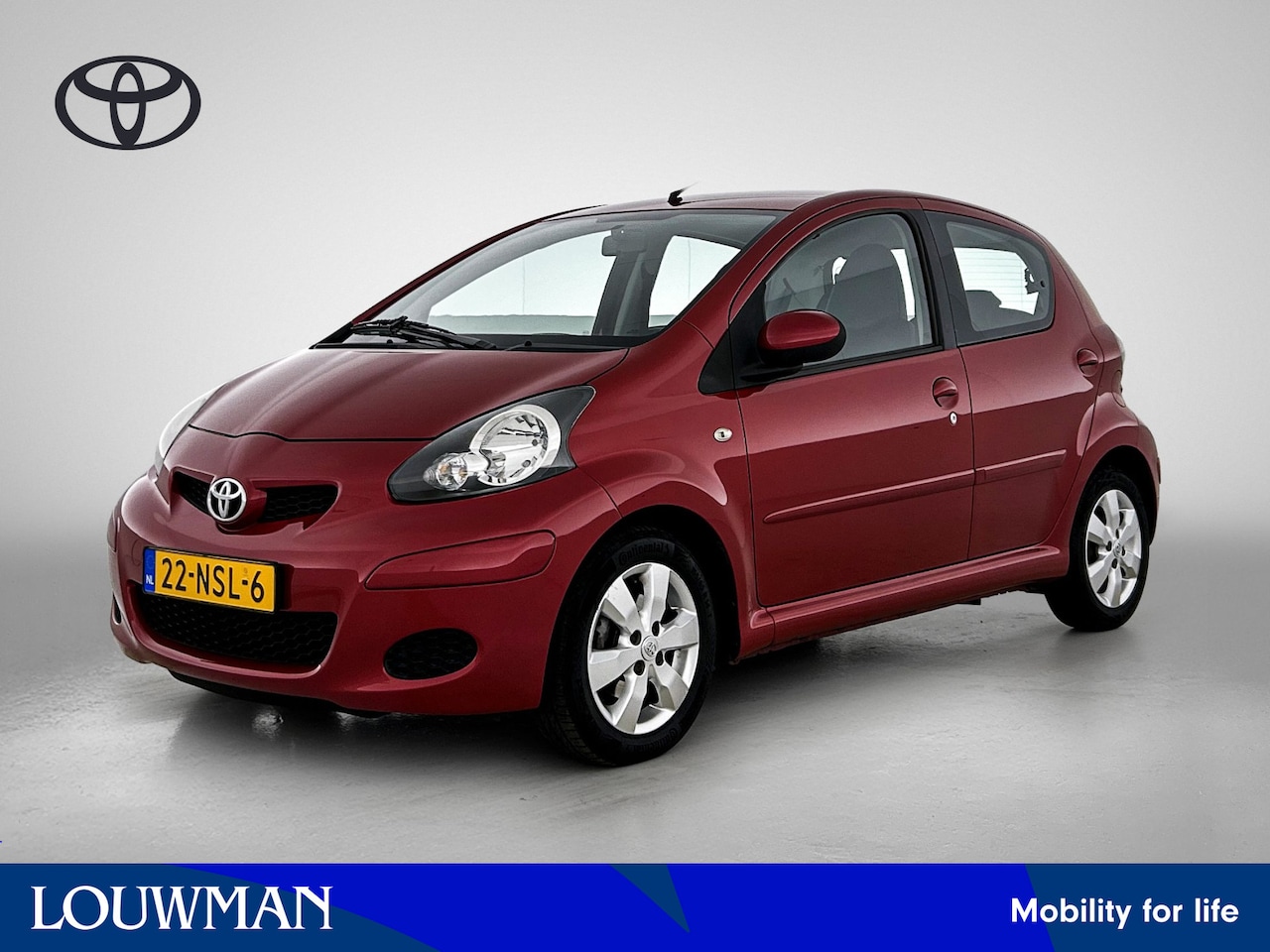 Toyota Aygo - 1.0-12V Aspiration Red Automaat | Half Lederen bekleding | Airco | Elektrische ramen voor - AutoWereld.nl
