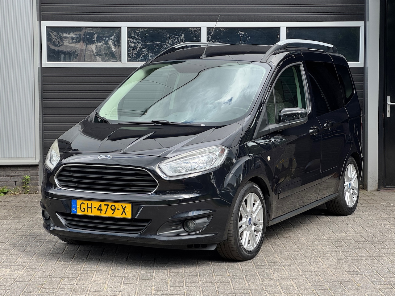 Ford Tourneo Courier - 1.0 Titanium Navi, Cruise, Airco, Camera, Stoelverwarming, NAP - AutoWereld.nl