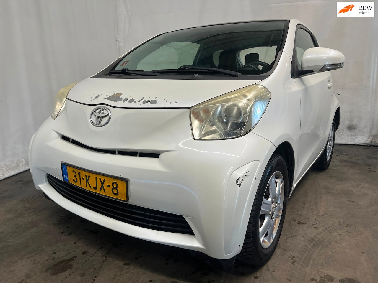 Toyota iQ - 1.0 VVTi Comfort - Achter-schade - AutoWereld.nl