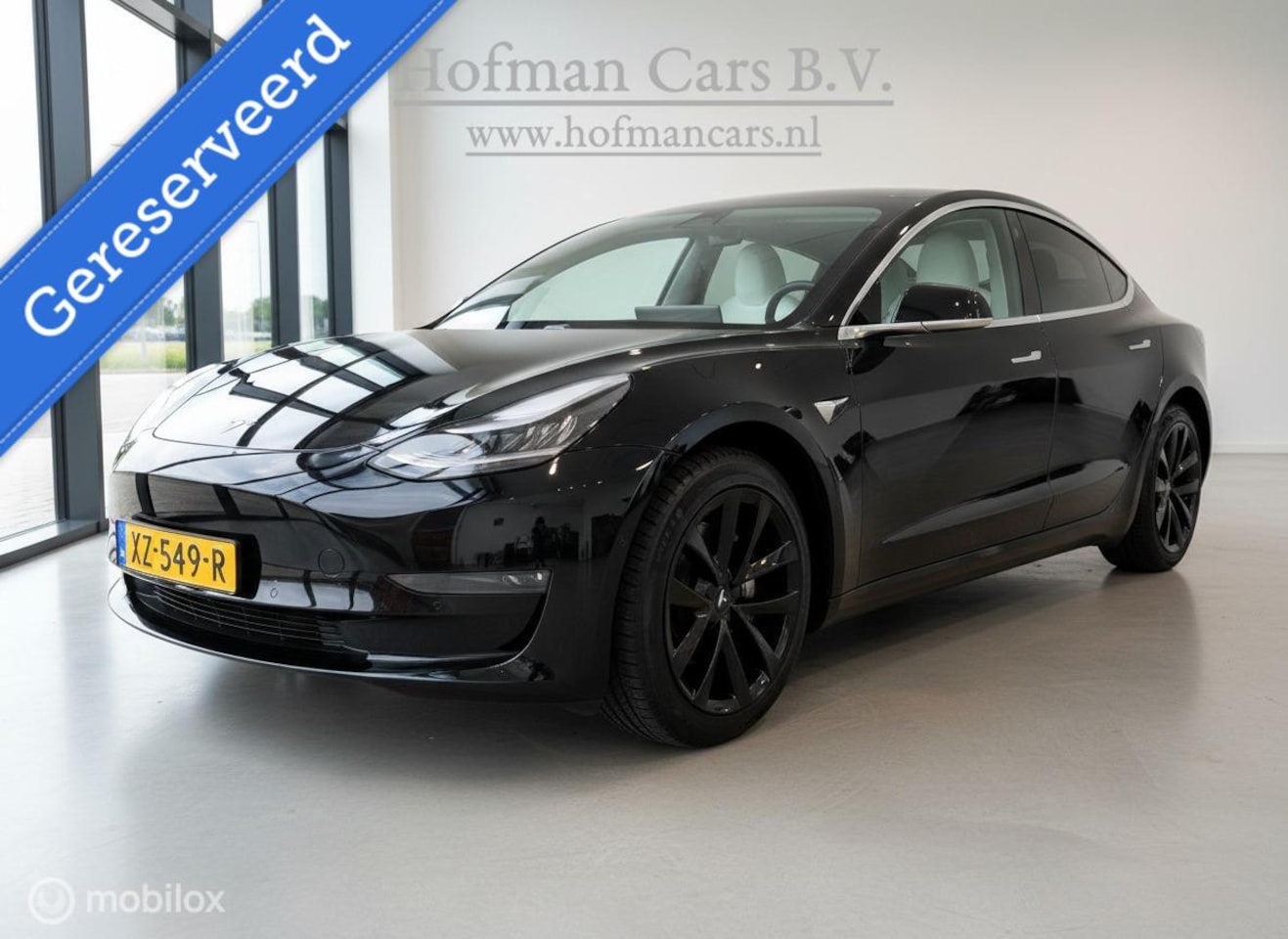 Tesla Model 3 - Long Range AWD 75 kWh | Zwart | Wit Interieur | Pano | SOH 85% | MOBA - AutoWereld.nl
