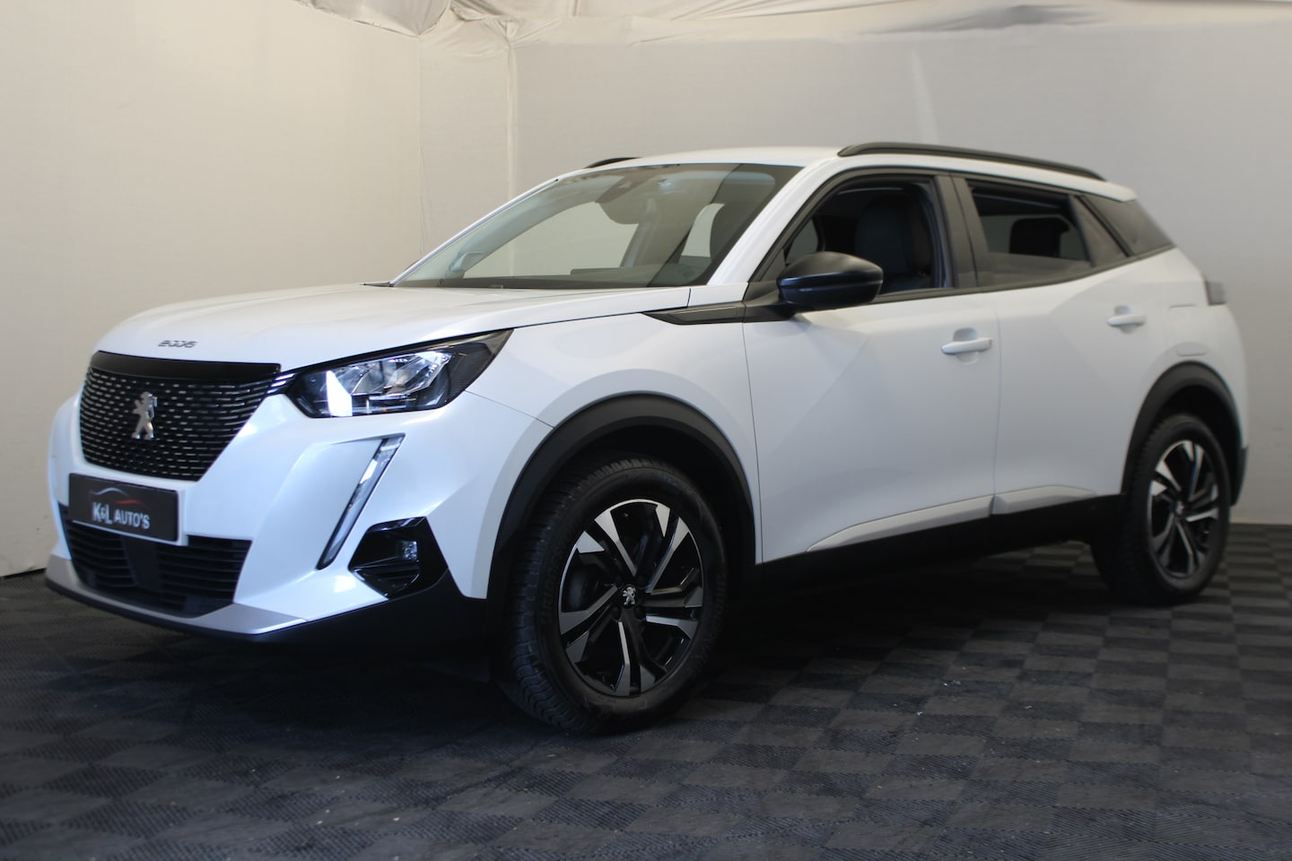 Peugeot 2008 - 1.2 PureTech Blue Lease Allure |Navi|Camera| - AutoWereld.nl