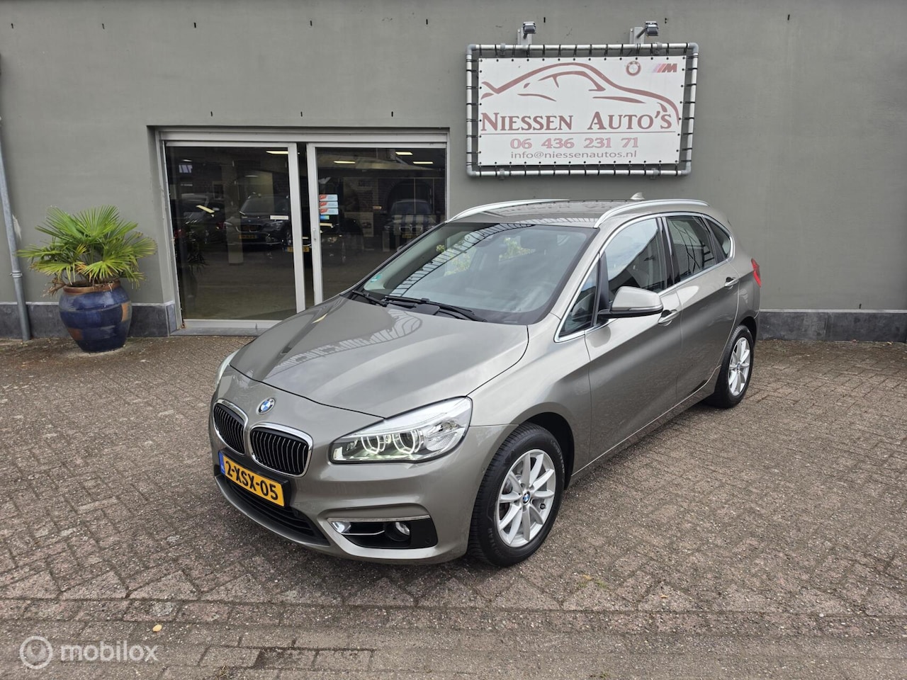 BMW 2-serie Active Tourer - 218i Luxory Line HUD/Led/Navi - AutoWereld.nl