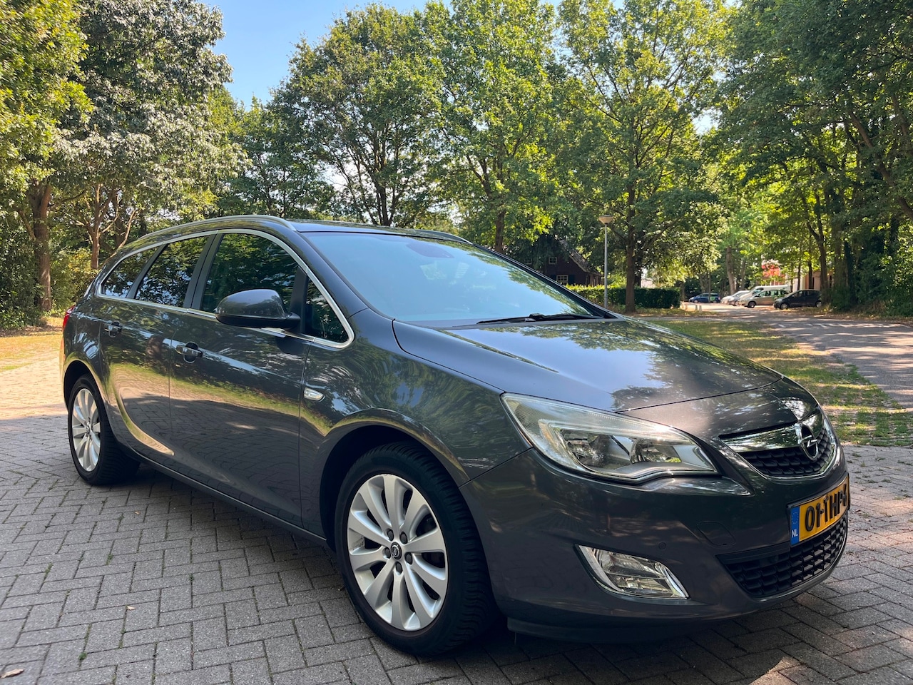 Opel Astra Sports Tourer - 1.4 Turbo Cosmo 2012 NIEUWE APK - AutoWereld.nl