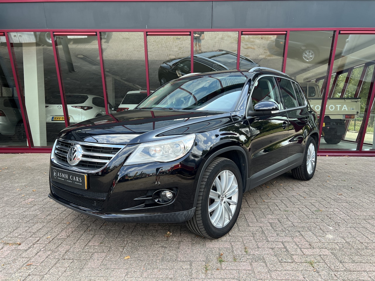 Volkswagen Tiguan - 2.0 TSI Sport&Style 4Motion | Trekhaak | Airco | Leder | Cruise | Stoelverw. | - AutoWereld.nl