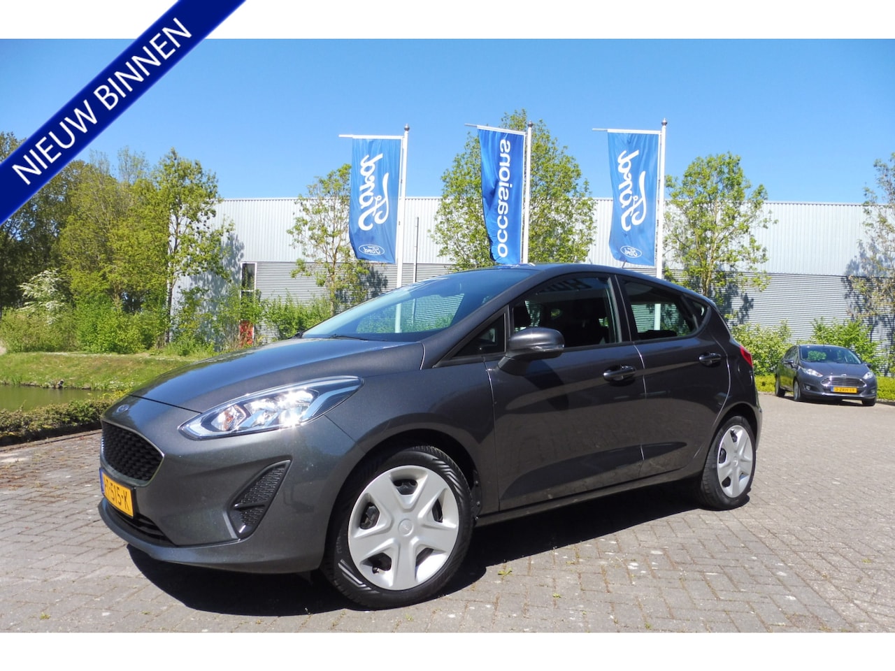 Ford Fiesta - 5-drs 1.1 86pk Trend Airco Crc Pdc Navigatie - AutoWereld.nl