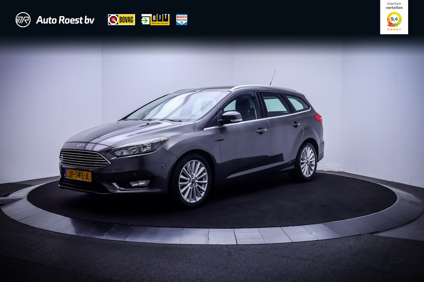 Ford Focus Wagon - 1.0 125pK TITANIUM NAVI | VOORRUITVERW. | CLIMA | CRUISE | PDC V+A | LMV 17'' - AutoWereld.nl