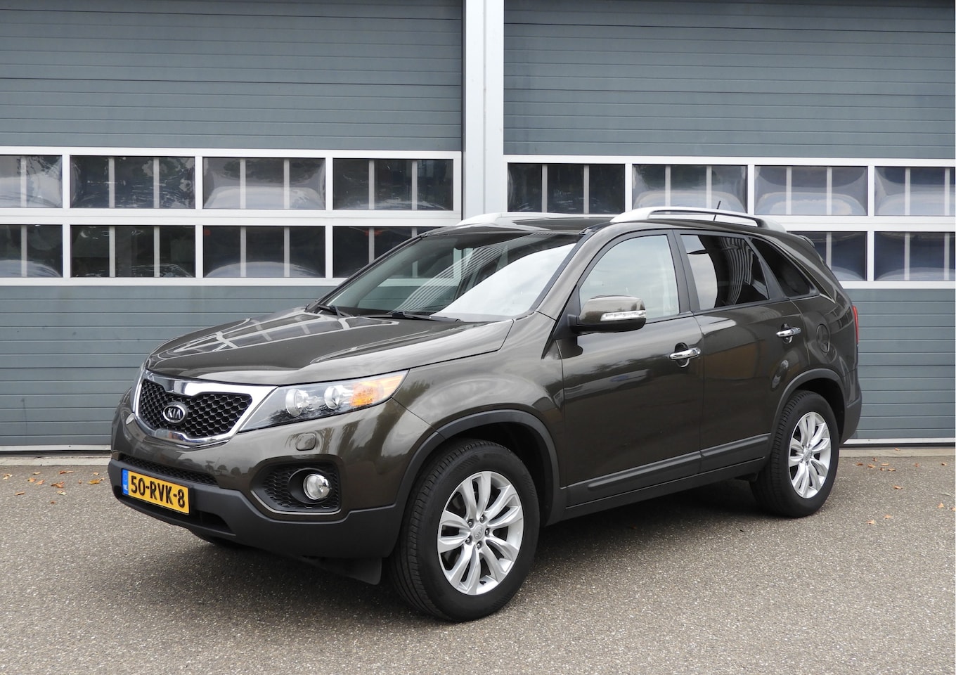 Kia Sorento - 2.4 AUT | LEDER | CRUISE | NAVI | AIRCO | STOELVERWARMING | PARKEERSENSOREN - AutoWereld.nl