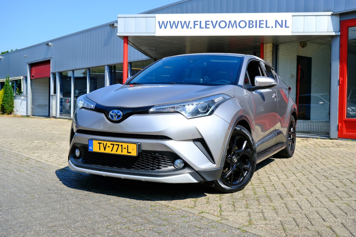 Toyota C-HR - 1.8 Hybrid Adventure Aut. Leder|Navi|Cam|JBL|LMV - AutoWereld.nl