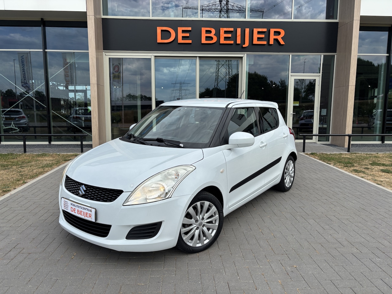 Suzuki Swift - 1.2 Business Edition 94pk Navi I Airco I Cruise - AutoWereld.nl