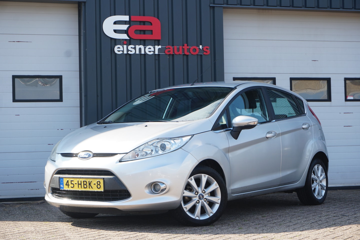 Ford Fiesta - 1.25 Ghia 82PK | CLIMA | CRUISE | PDC | TREKHAAK | - AutoWereld.nl