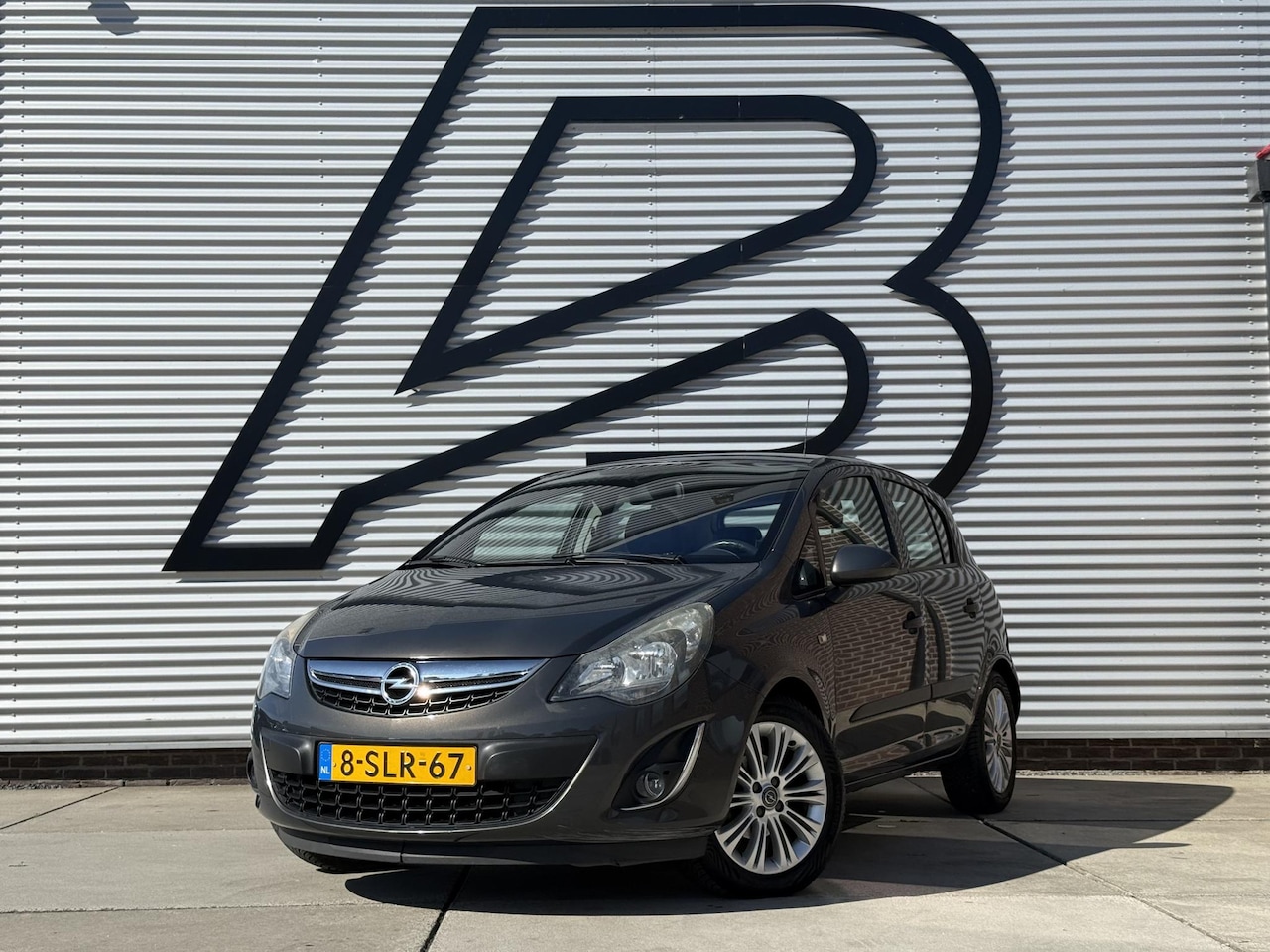 Opel Corsa - 1.4-16V Cosmo 1e Eigenaar|Clim|Cruise|Trekhaak|Navi|Lm velgen|N.A.P|APK tot 11-2026 - AutoWereld.nl