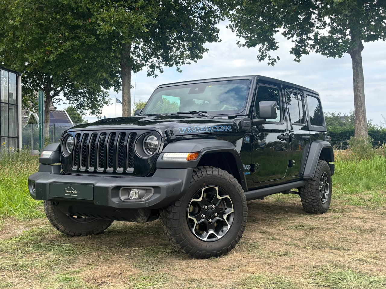 Jeep Wrangler Unlimited - 4xe 380 Rubicon CAMERA V+A|ACC|STUUR+STOELVERW.|1E EIGENAAR|LEASE 598 EURO/MAAND 17597 / 4 - AutoWereld.nl