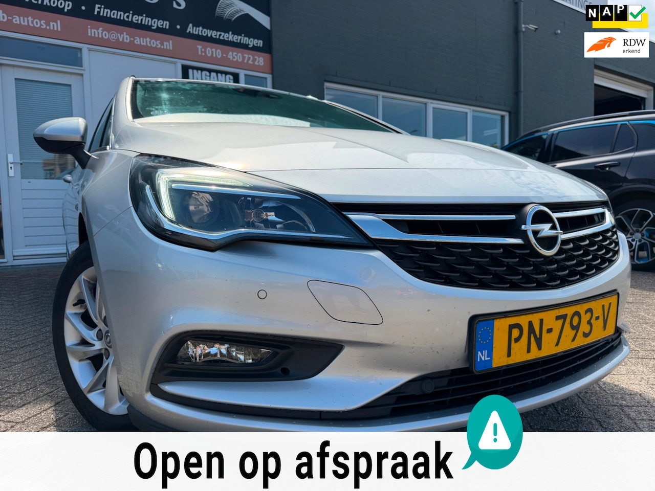 Opel Astra Sports Tourer - 1.0 Innovation van 2de Eig met parkeersensoren en navigatie en bluetooth en cruis controle - AutoWereld.nl