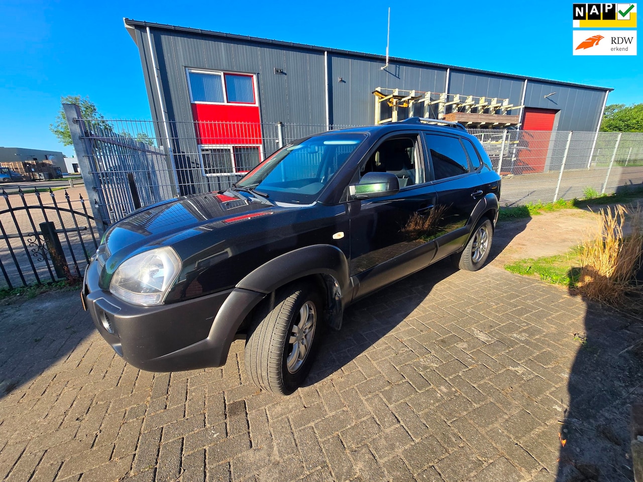 Hyundai Tucson - 2.0i Style 2.0i Style - AutoWereld.nl
