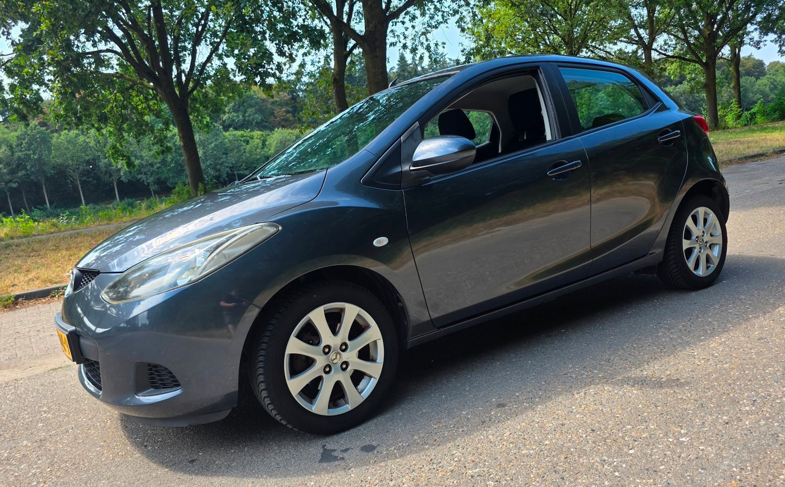 Mazda 2 - 1.3 S-VT - NL Auto - 2e Eigenaar- Airco - Stoelverwarming - AutoWereld.nl