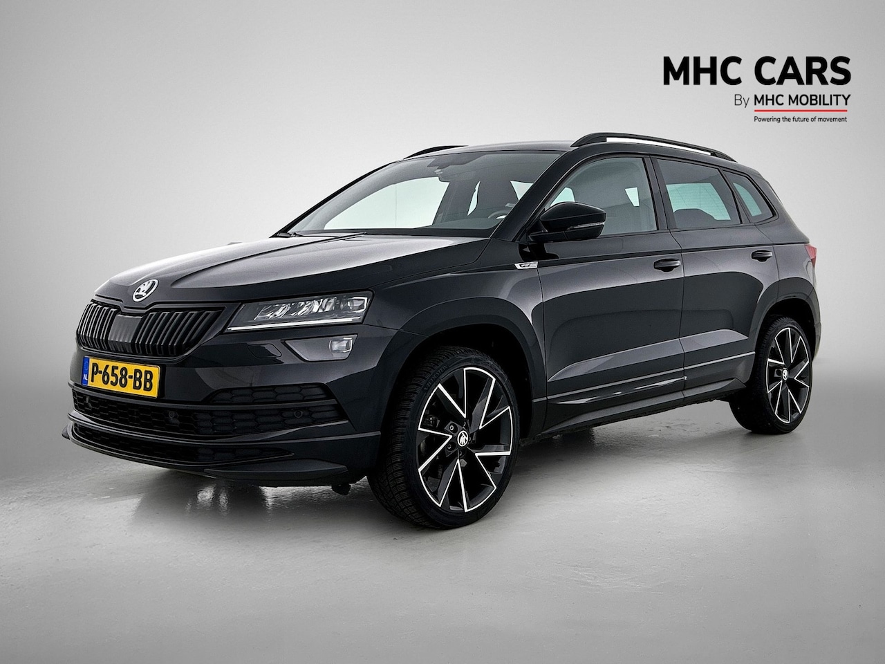 Skoda Karoq - 1.5 TSI ACT Sportline Business | Trekhaak | Navi | Clima | - AutoWereld.nl