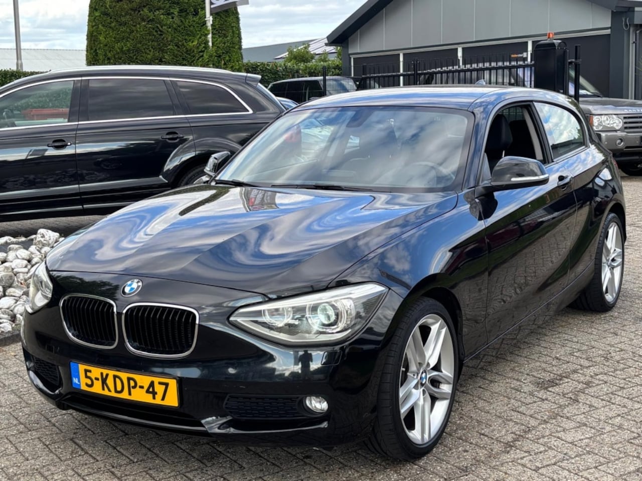 BMW 1-serie - 116i Sport Upgrade Edition 2013 Zwart NL Auto Xenon - AutoWereld.nl