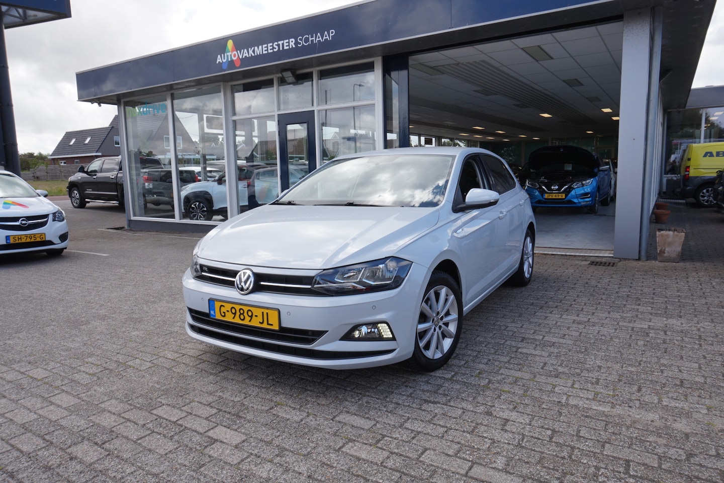 Volkswagen Polo - 1.0 TSI Comfortline 1.0 TSI Comfortline , Incl nw apk/beurt & 12 mnd bovag garantie - AutoWereld.nl