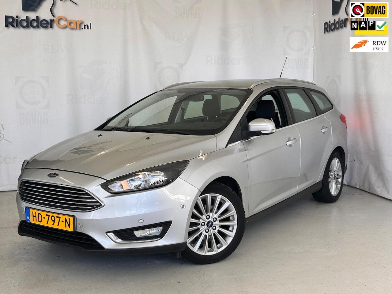 Ford Focus Wagon - 1.0 Titanium Edition|NAP|NAVI|CRUISE|AIRCO|PARKSENS| - AutoWereld.nl