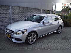 Mercedes-Benz C-klasse Estate - 180 Ambition Autom Half Leder/Stof Sportst Stoelverw Navi Clima Cruise LED Kopl 2x PDC LMV