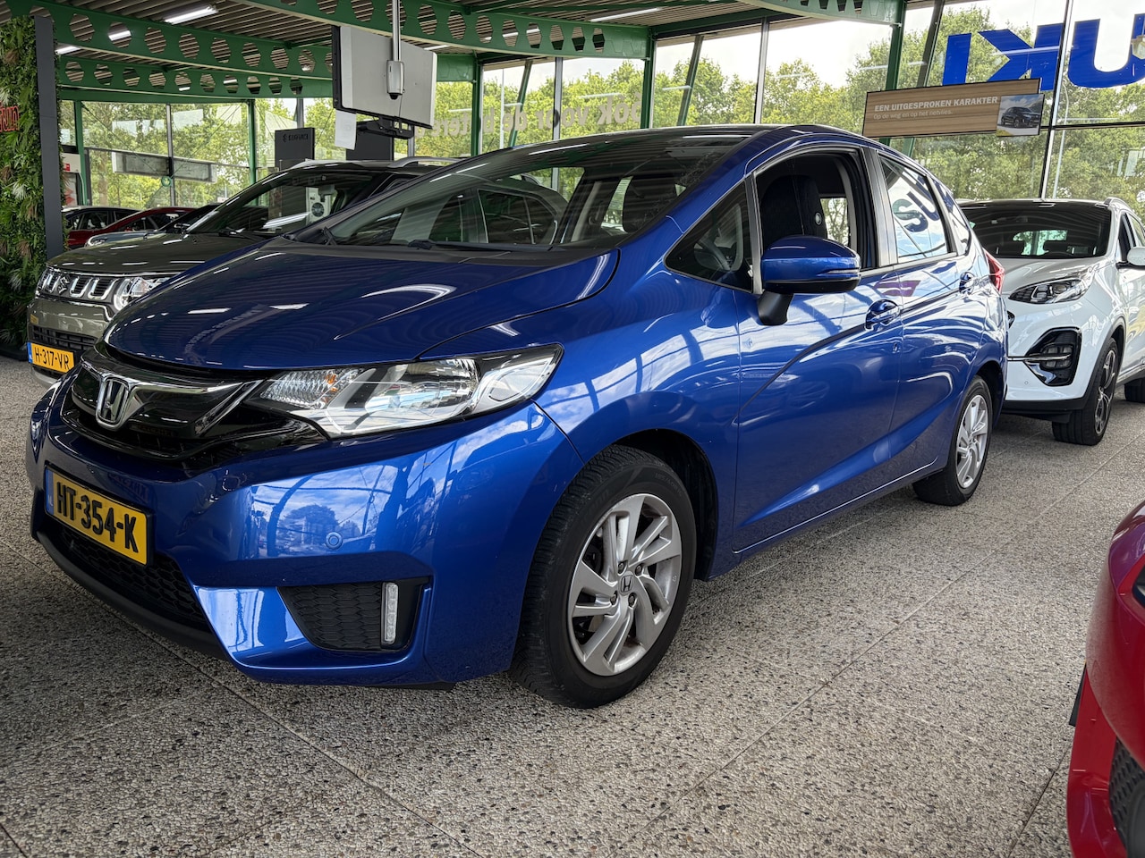 Honda Jazz - 1.3 i-VTEC Comfort automaat 102pk | NL-auto | Parkeersensoren vóór én achter | - AutoWereld.nl