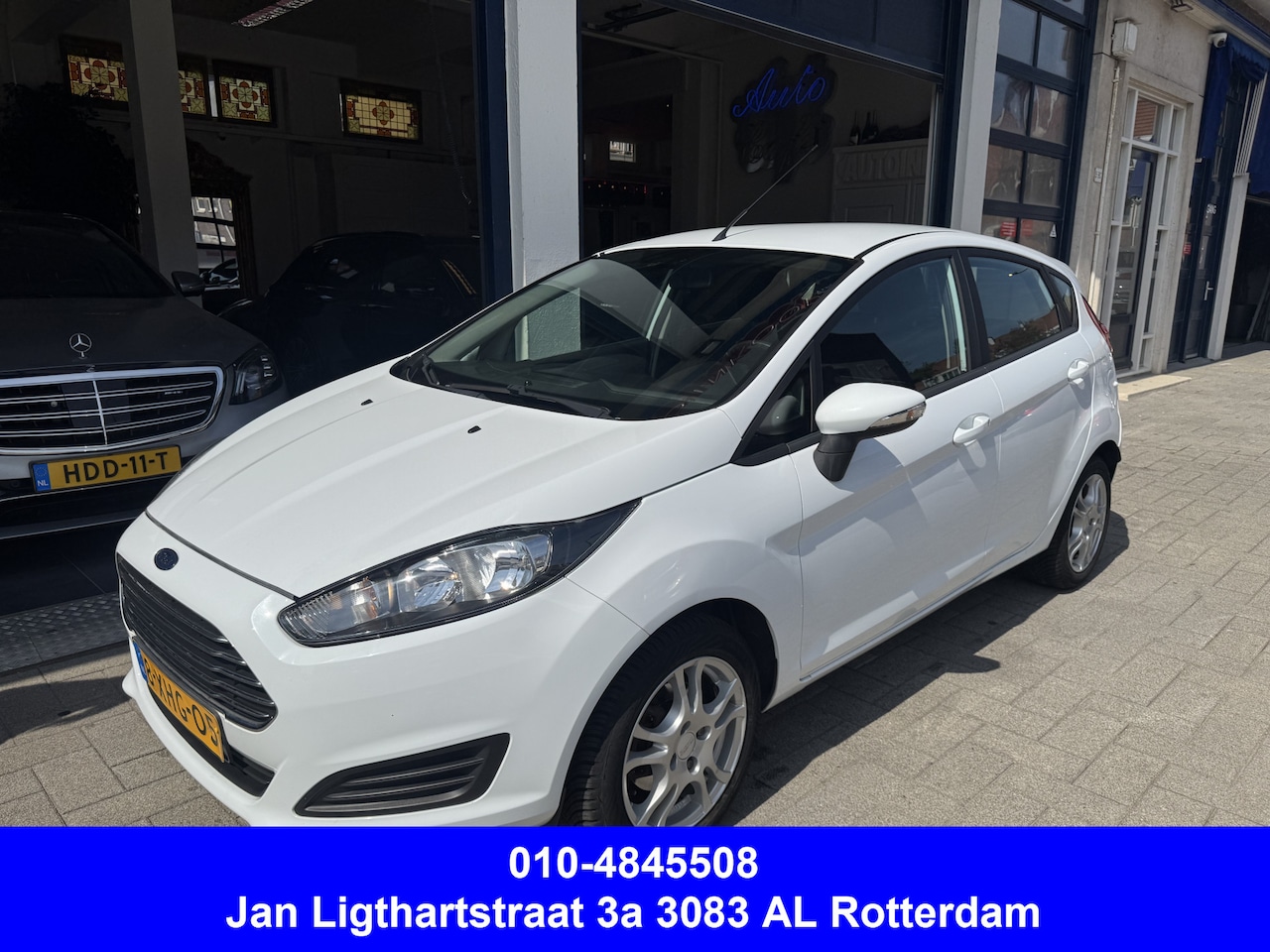 Ford Fiesta - 1.0 Style 5-DEURS/AIRCO/NAVI/NAP/NW APK - AutoWereld.nl