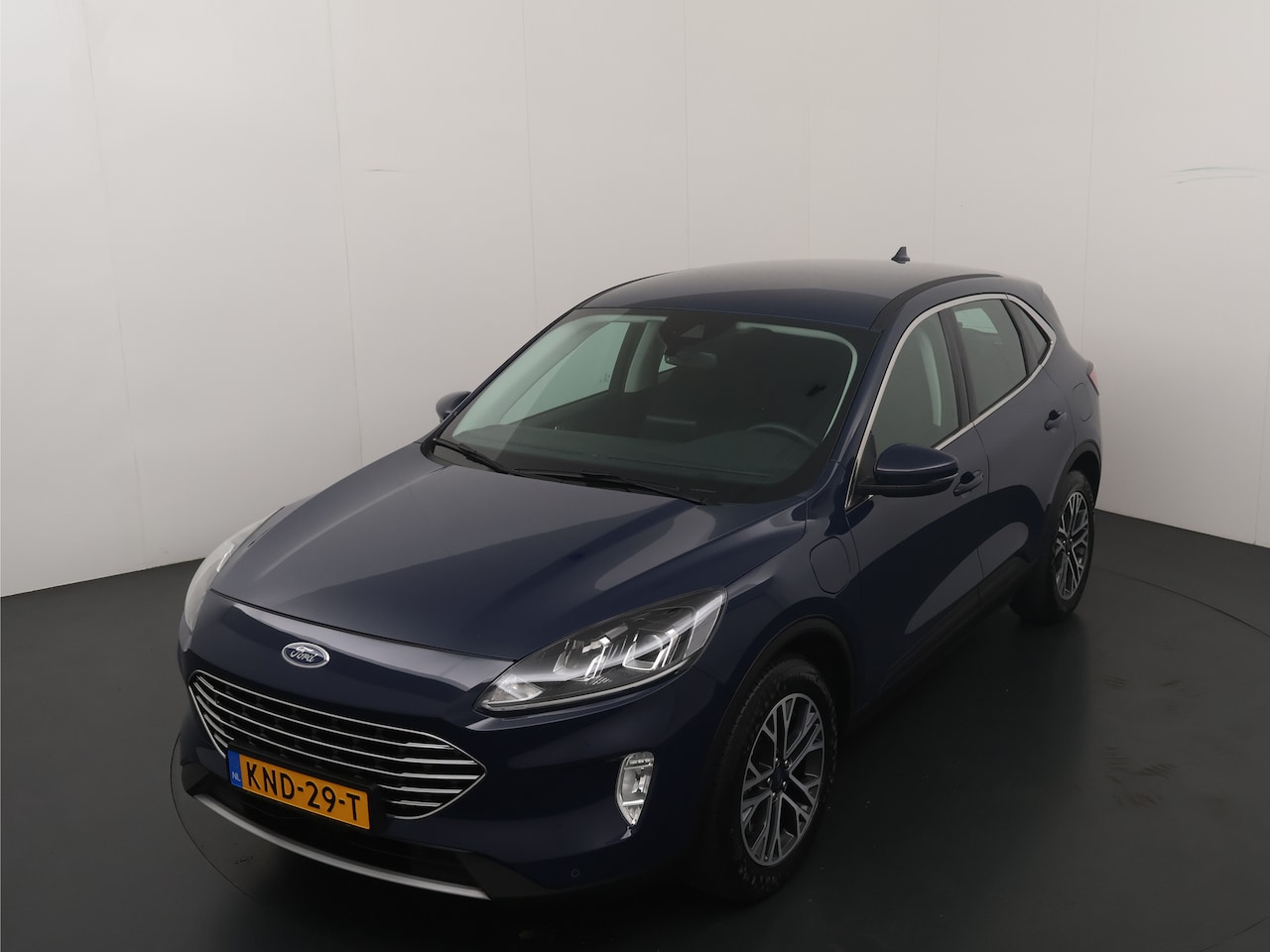 Ford Kuga - 2.5 PHEV 225pk Titanium | Winterpack | Cruise control | Climate Control | Parkeersens V&A - AutoWereld.nl