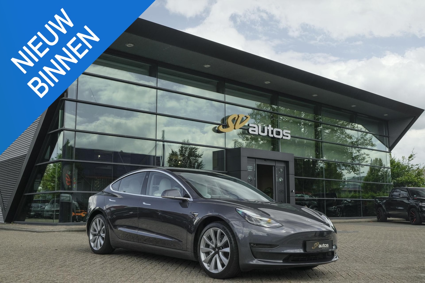 Tesla Model 3 - Long Range 351pk AWD 75 kWh *BTW* Panoramadak 19" LMV Sport Autopilot - AutoWereld.nl