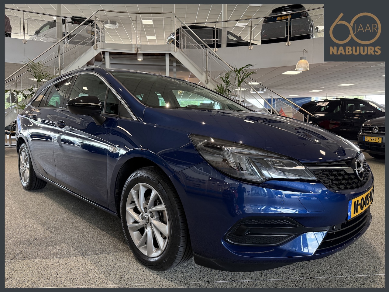 Opel Astra Sports Tourer - 1.2 Business Elegance 1.2 Business Elegance, NL auto, Trekhaak, Camera - AutoWereld.nl