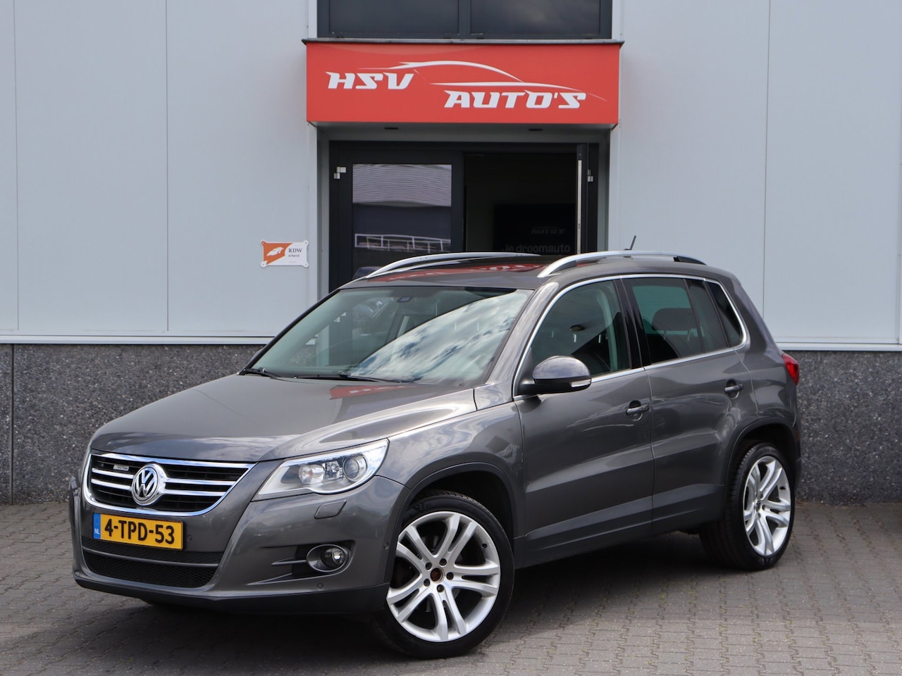 Volkswagen Tiguan - 2.0 TSI Sport&Style 4Motion automaat LM navi - AutoWereld.nl