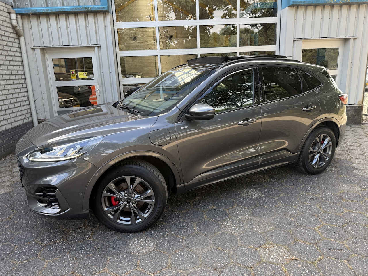Ford Kuga - 2.5 PHEV ST-Line X / Trekhaak/ Panoramadak - AutoWereld.nl