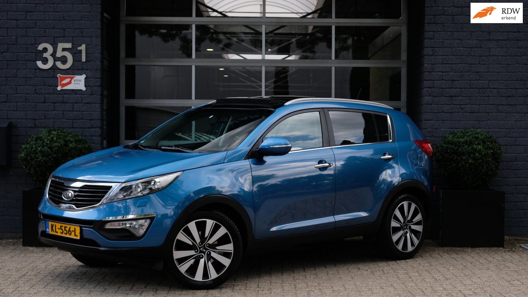 Kia Sportage - 2.0 X-clusive Bluetooth Cruise Pano Led Trekhaak 4x Stoelverwarming - AutoWereld.nl