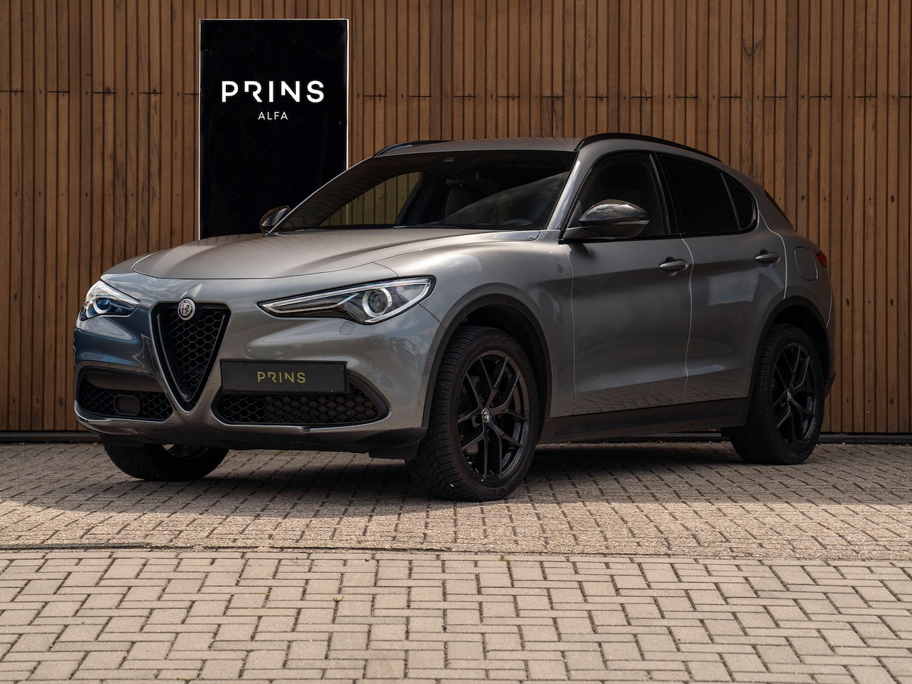 Alfa Romeo Stelvio - 2.0T AWD B-Tech | Veloce stoelen | Lederen dash. | Adapt. cruise - AutoWereld.nl