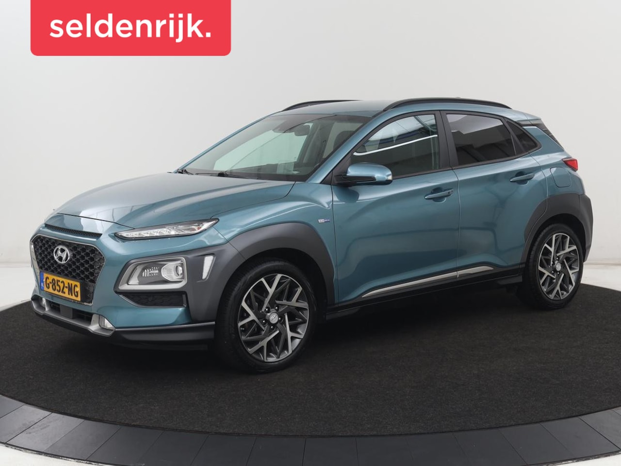 Hyundai Kona - 1.6 GDI HEV Premium | Stoelventilatie | Leder 1e eigenaar | Adaptive cruise | Head-Up | Tr - AutoWereld.nl