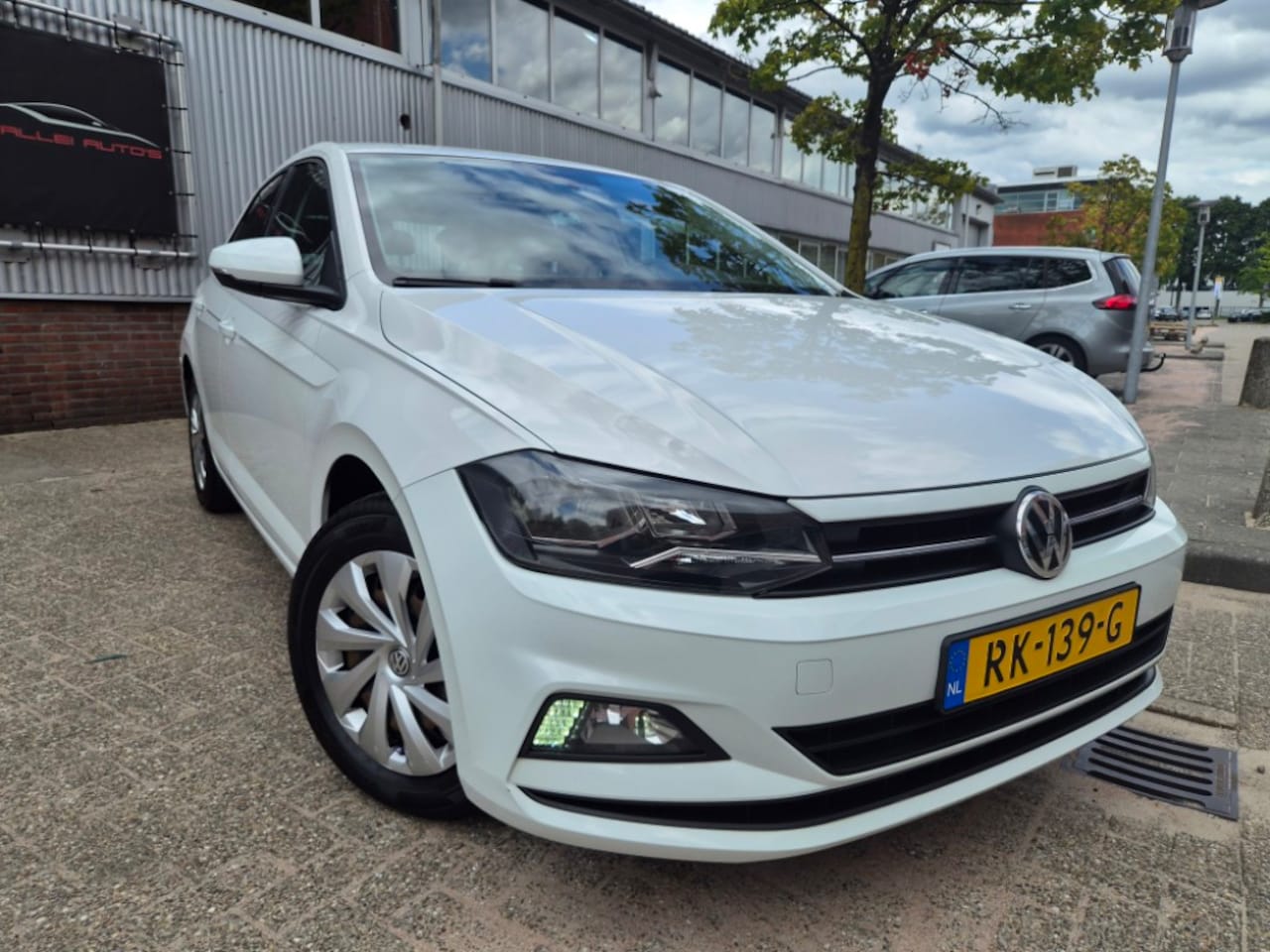 Volkswagen Polo - 1.0 TSI Comfortline CRUISE/AIRCO/APPLE CAR - AutoWereld.nl