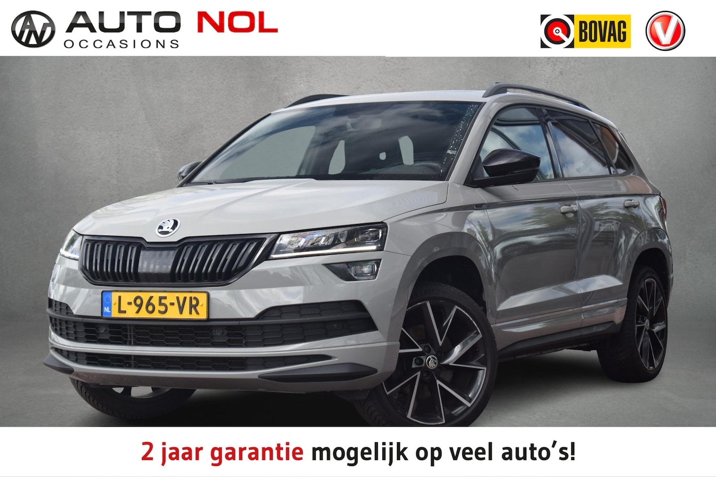 Skoda Karoq - 1.5 TSI ACT Sportline Business | Pano | Sportstoelen | CarPlay | Stoelverwarming - AutoWereld.nl