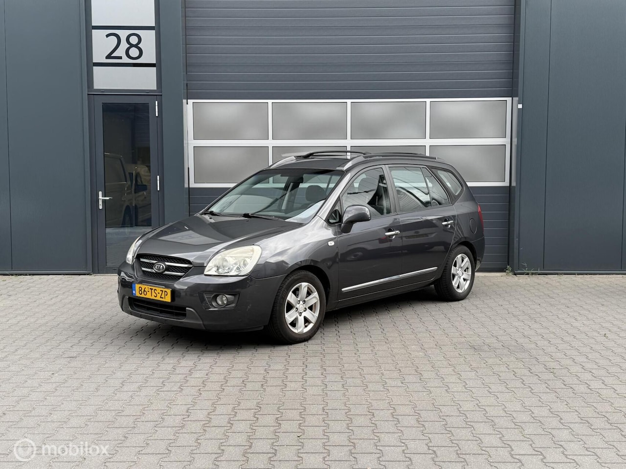 Kia Carens - 2.0 CVVT X-clusive 2.0 CVVT X-clusive - AutoWereld.nl