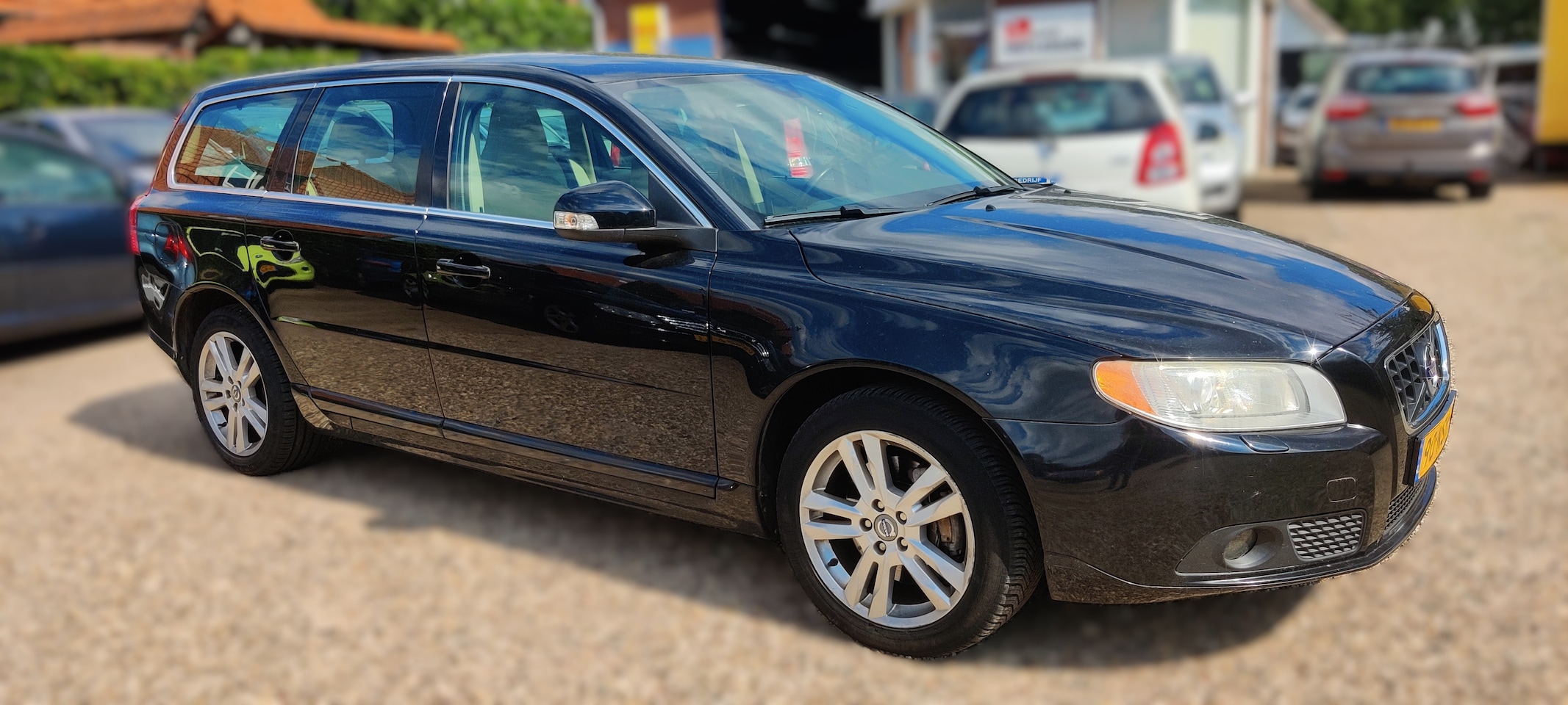Volvo V70 - 2.0T Summum Lederen bekleding, airco, cruise control.