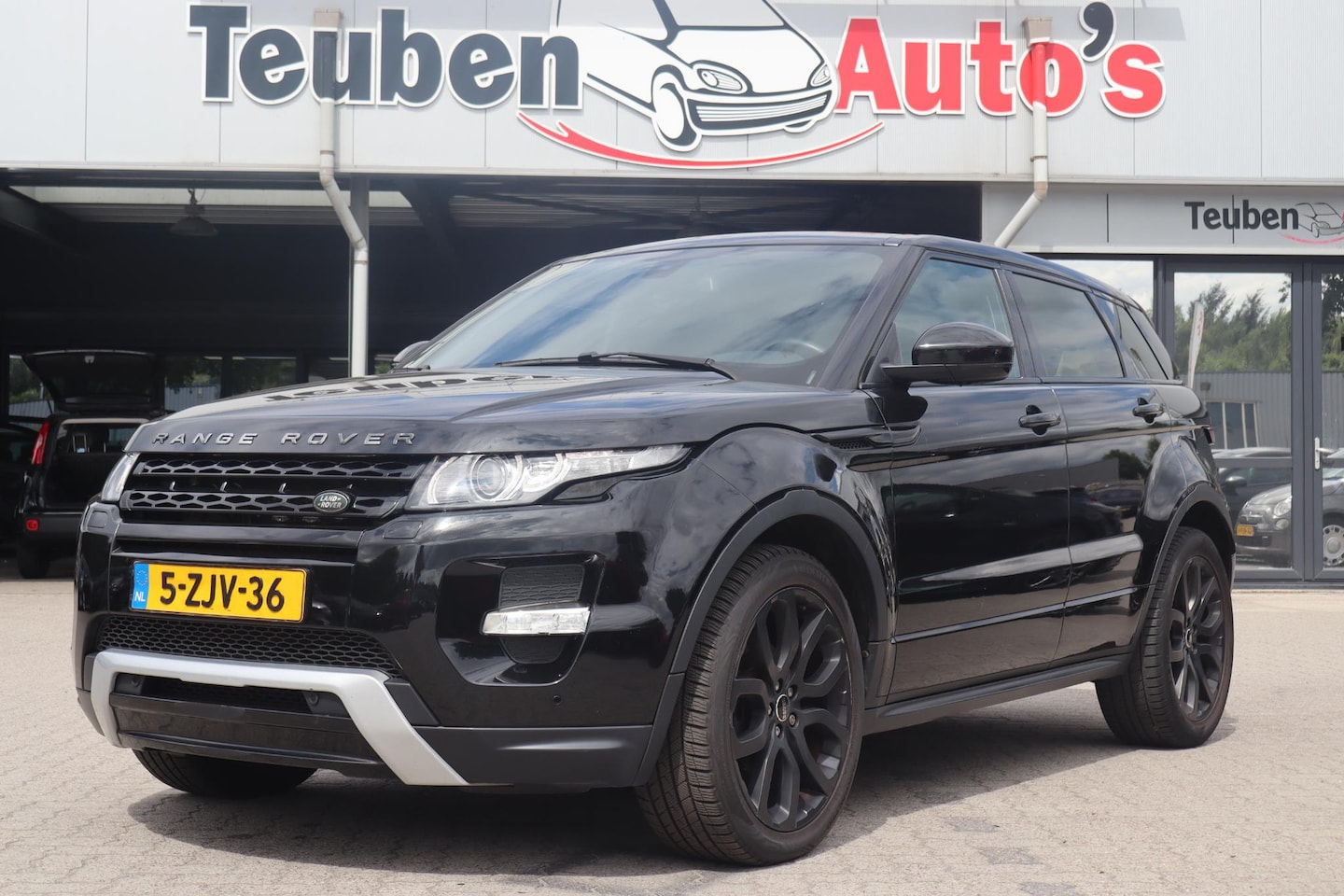 Land Rover Range Rover Evoque - 2.0 Si 4WD Prestige | Automaat | Stoel en stuurwiel verwarming | Climate control | Navigat - AutoWereld.nl