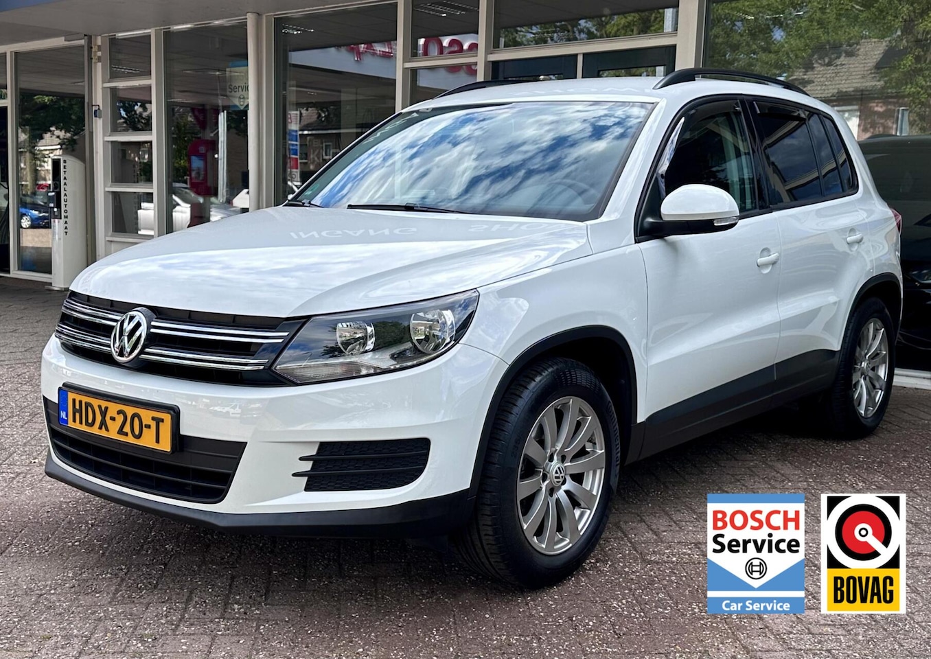 Volkswagen Tiguan - 1.4 TSI Comfort&Design Navi, Climat, Cruise, Trekhaak.. - AutoWereld.nl