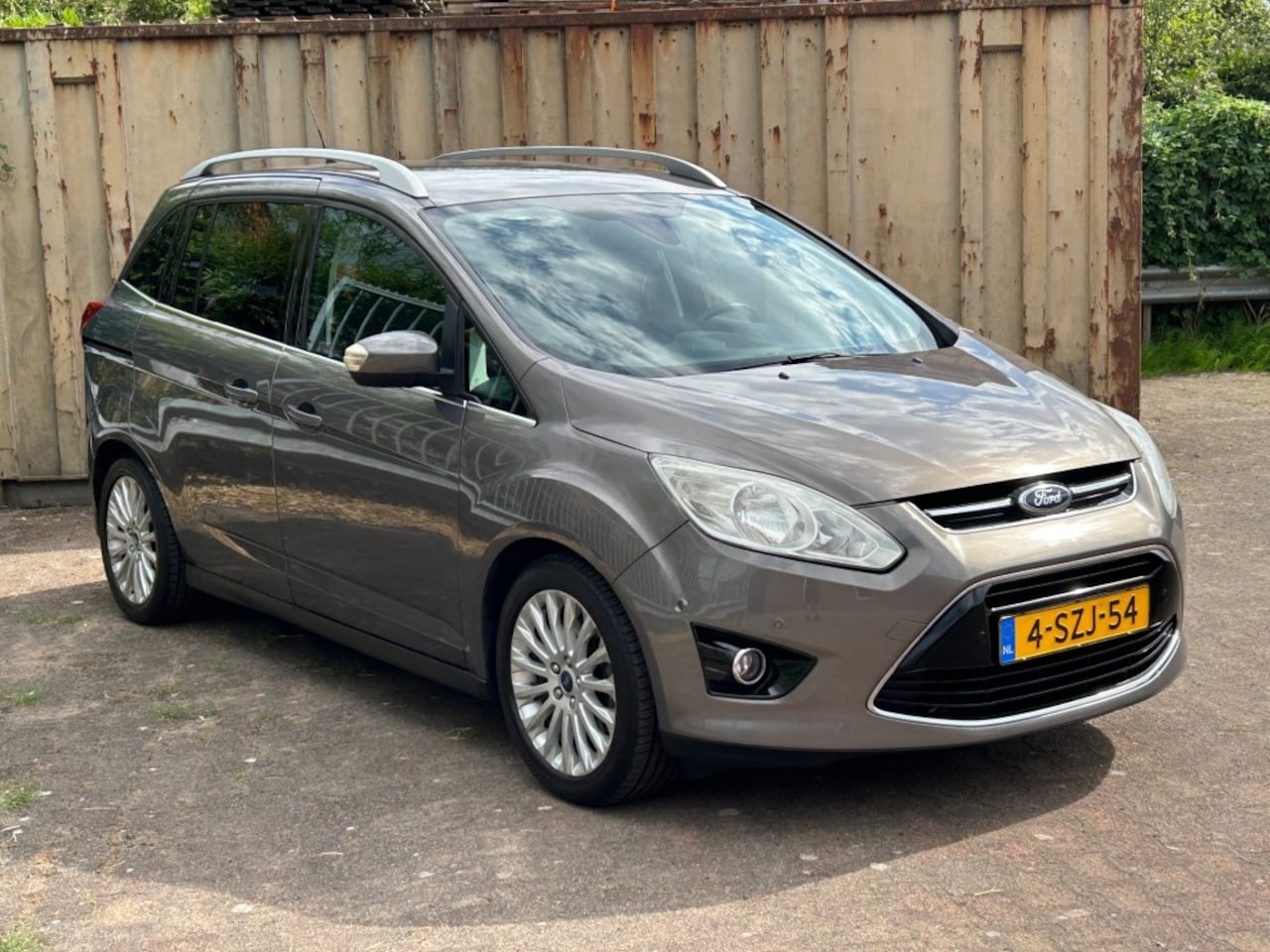 Ford Grand C-Max - 1.0 LEASE TITANIUM 125 PK. 7PERSOONS - AutoWereld.nl