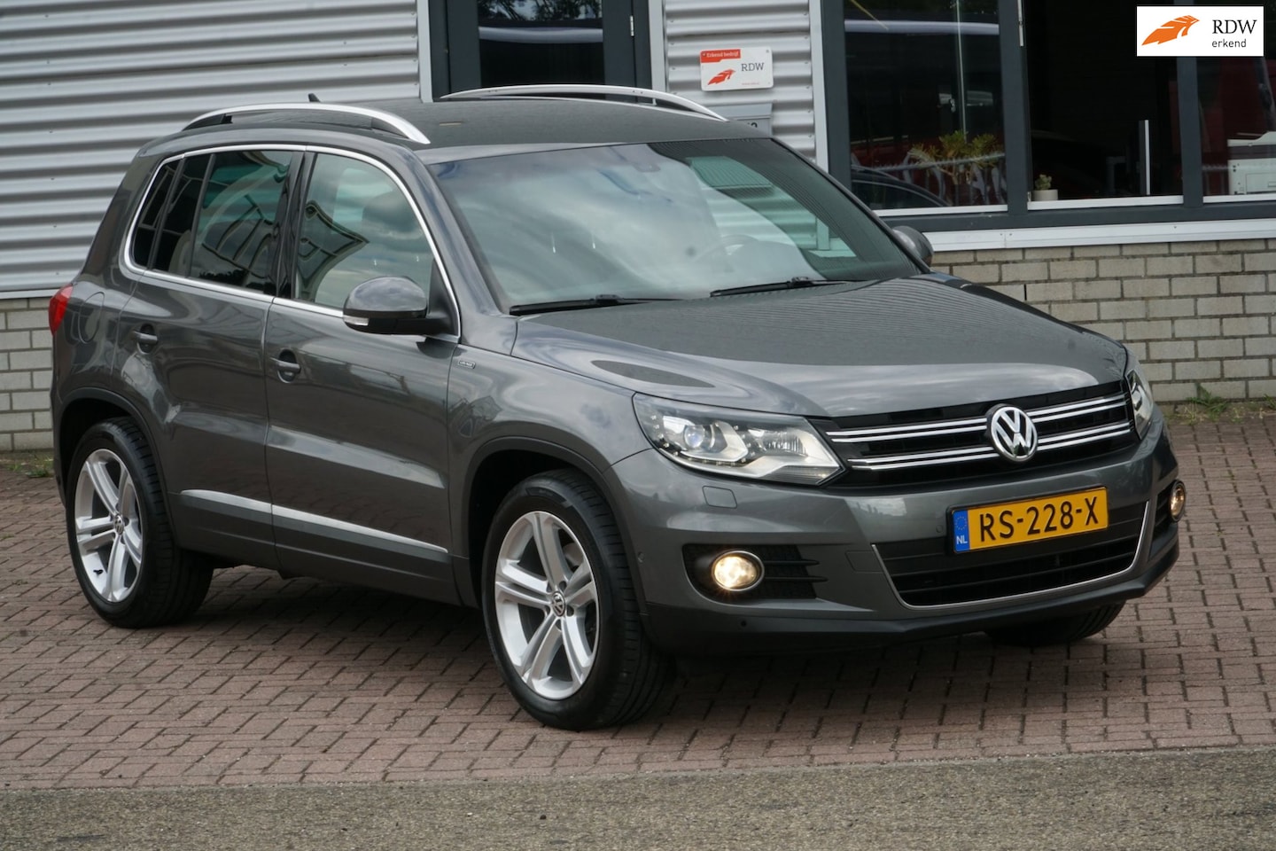 Volkswagen Tiguan - 1.4 TSI Sport&Style NIEUWSTAAT - AutoWereld.nl
