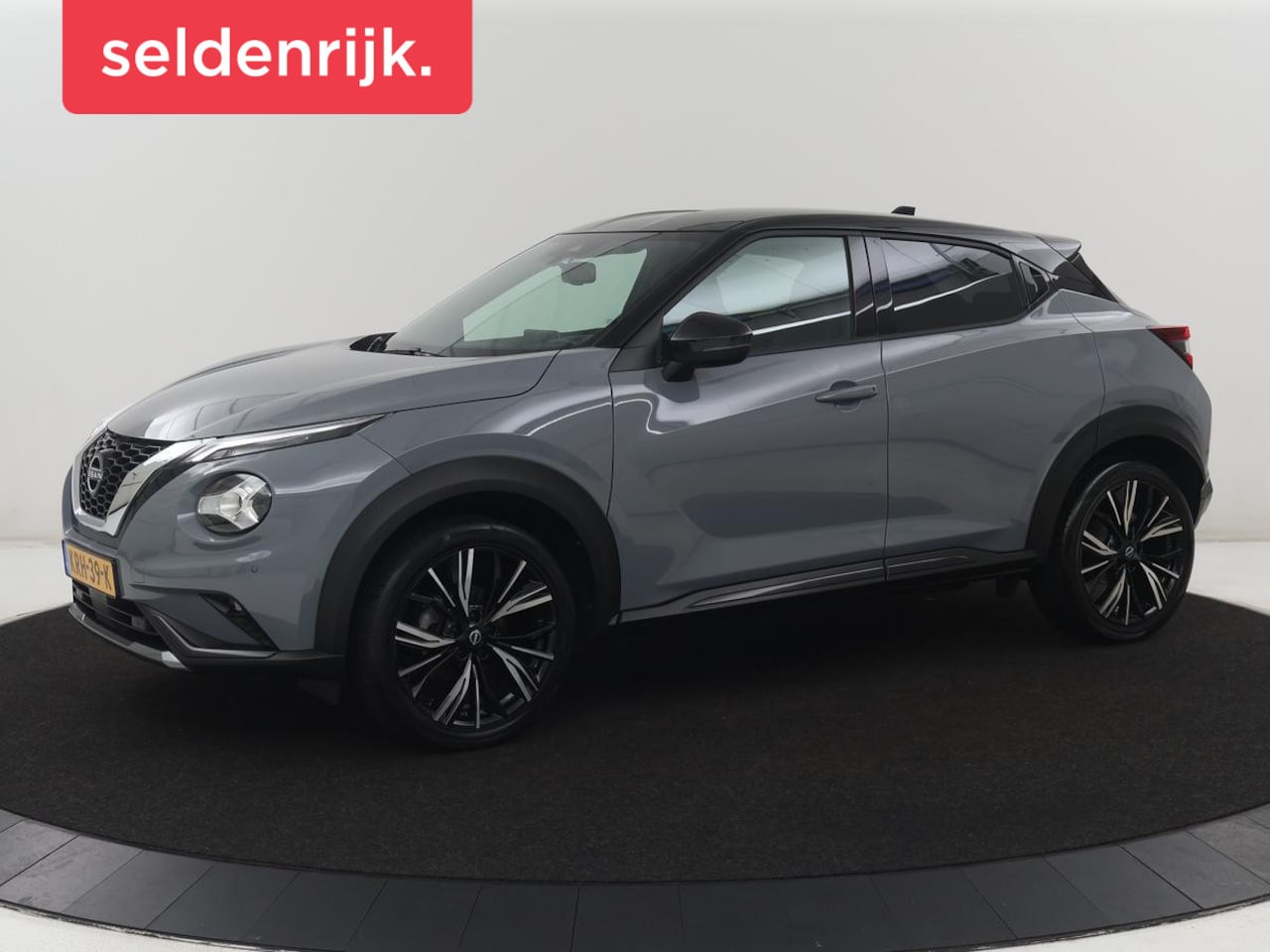 Nissan Juke - 1.0 DIG-T N-Design | Half leder | Carplay | Cruise control | Park assist | Camera | Climat - AutoWereld.nl