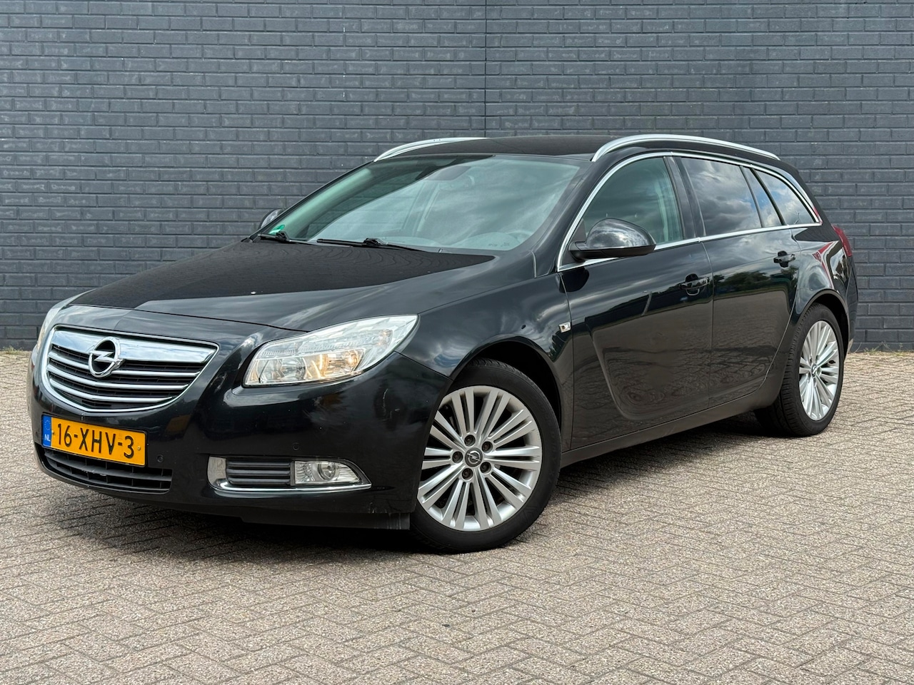 Opel Insignia Sports Tourer - 1.4 Turbo EcoFlex Bj 2012 ECC Airco Navi Pdc - AutoWereld.nl