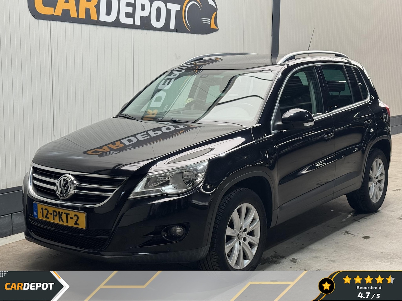 Volkswagen Tiguan - 1.4 TSI Sport&Style - AutoWereld.nl