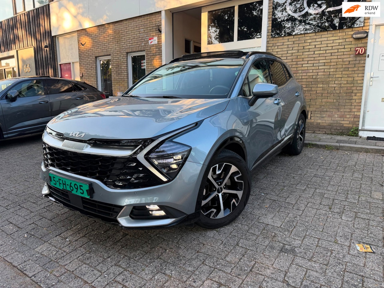 Kia Sportage - 1.6 T-GDi Hybrid DynamicPlus Pano Garantie Dealer Onderhouden - AutoWereld.nl