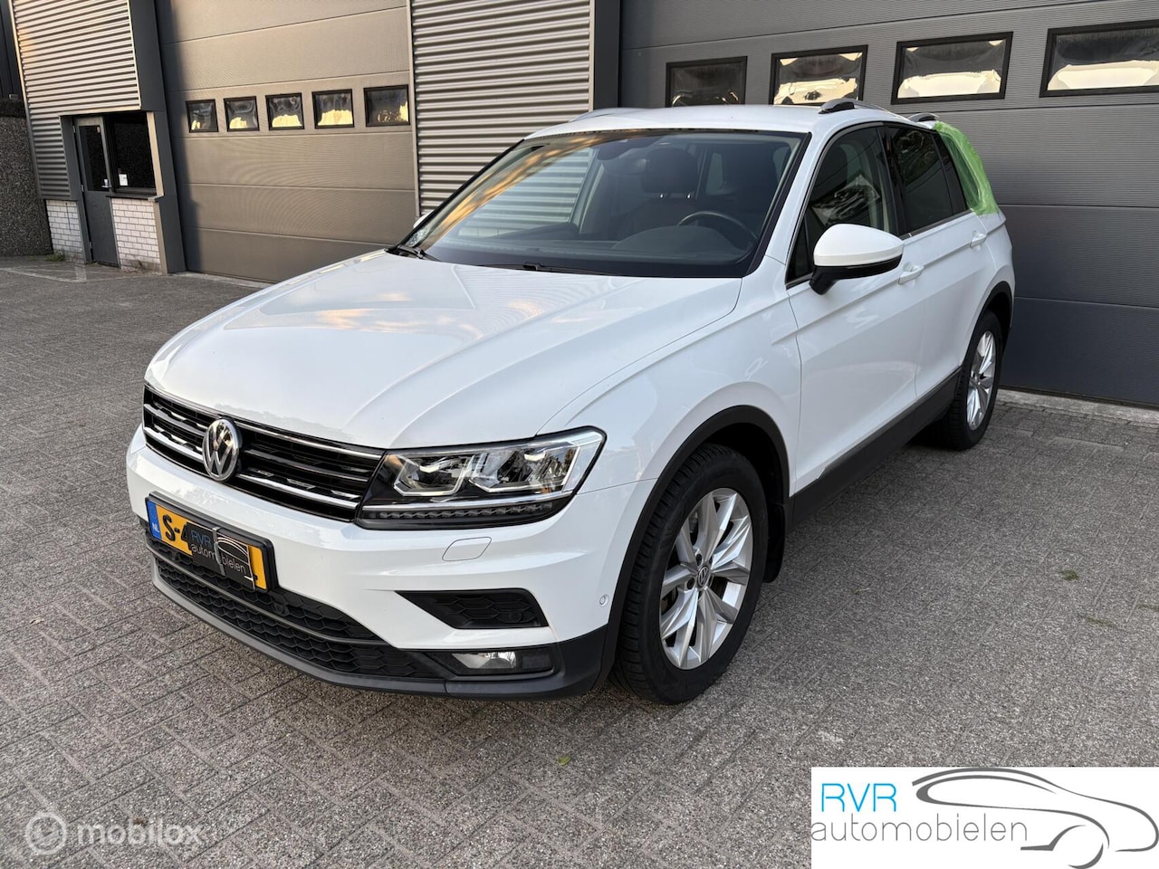 Volkswagen Tiguan - 2.0 TSI 4Motion Highline 2.0 TSI 4Motion Highline - AutoWereld.nl