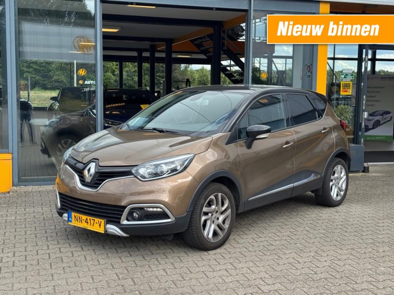 Renault Captur - 1.2 TCe 120pk Dynamique - climate control - trekhaak - AutoWereld.nl